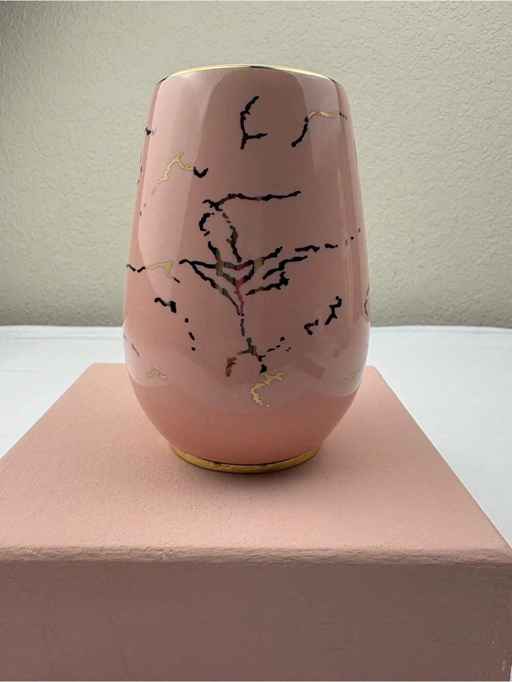 Pink ceramic enamel mug decorated with a 3D floral, rhinestones, and gold trim.